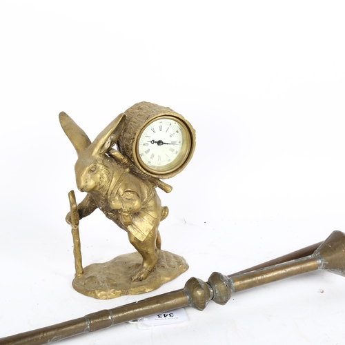 343 - A Vintage brass rabbit clock, 18cm, an Eastern brass horn, and a copper horn