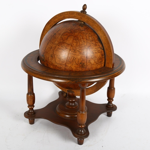 346 - A painted wood terrestrial globe in stand, height 40cm