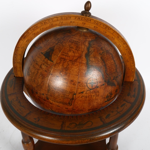 346 - A painted wood terrestrial globe in stand, height 40cm