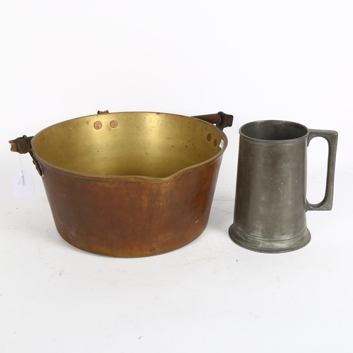 348 - A brass jam pan with steel swing handle, and a Sheffield pewter mug