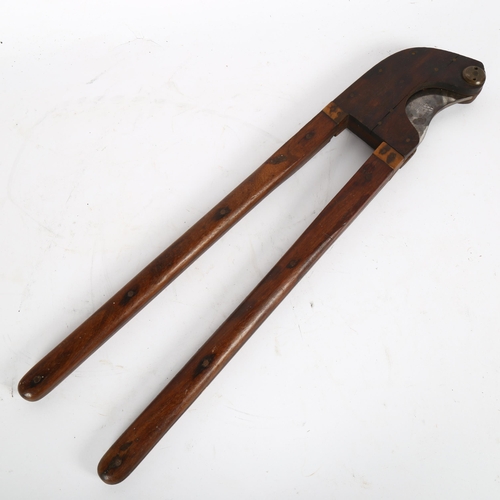 350 - A 19th century rosewood and steel veterinary tail docker tool, by Arnold & Sons of London, length 49... 