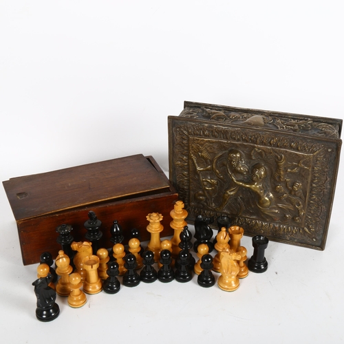 351 - A turned wood chess set in box, King height 8.5cm, and an embossed brass box, with design of figures... 