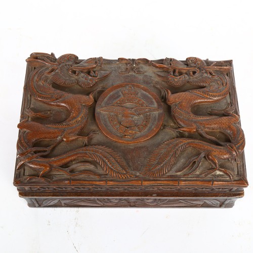 229 - A Chinese hardwood box with applied carved dragon decoration, and Royal Air Force armorial 