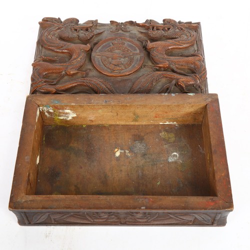 229 - A Chinese hardwood box with applied carved dragon decoration, and Royal Air Force armorial 