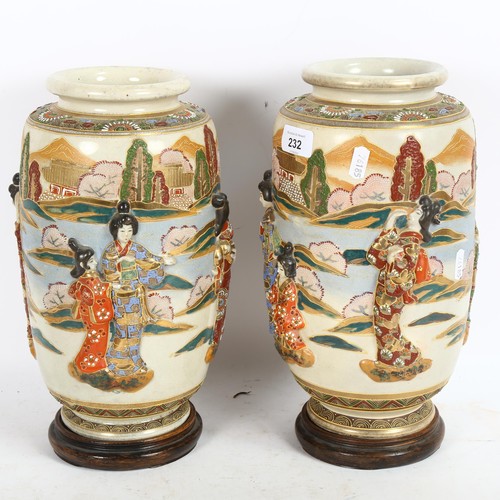 232 - A pair of large Japanese Satsuma cylinder vases, with applied Geisha and gilded decoration, on turne... 