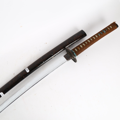 816 - A reproduction Samurai katana and scabbard, length 104cm