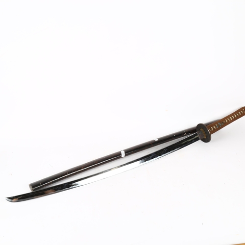 816 - A reproduction Samurai katana and scabbard, length 104cm