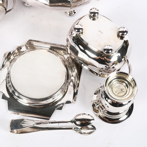 1002 - A silver plated 3-piece tea set, sugar tongs, toast rack etc