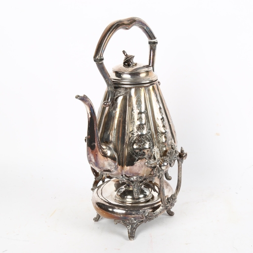 1003 - An Antique electroplate spirit kettle on stand, with burner, having allover chased engraved decorati... 