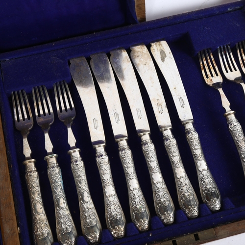 1008 - An early 20th century Mappin & Webb silver plated fish service for 12 people, with engraved handles,... 