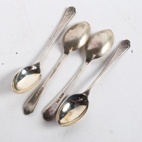 1009 - A cased set of 6 Walker & Hall silver teaspoons, with golfing motif handles