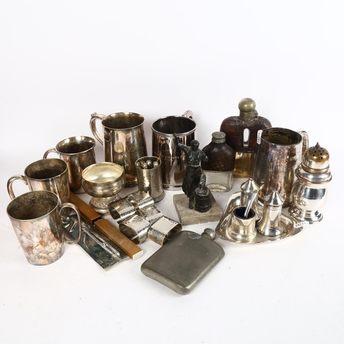 1017 - A group of silver plated ware, to include 2 hip flasks, tankards, cruet set etc