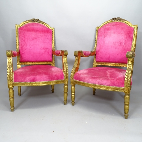 2503 - A pair of gilt painted French open arm chairs