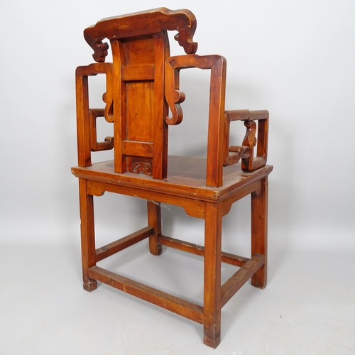 2515 - A Chinese hardwood open arm chair, with carved back