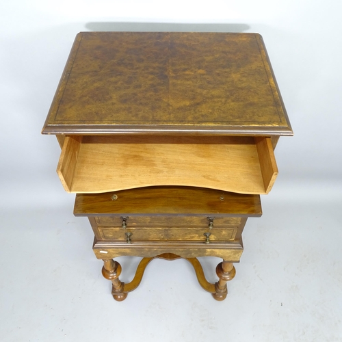 2517 - A reproduction burr-walnut and ebony-strung 1-section chest on stand/music cabinet, having 5 fall-fr... 