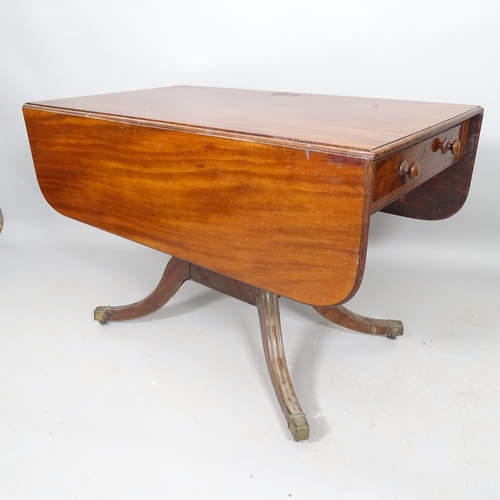 2519 - A 19th century mahogany drop leaf table, with end frieze drawer, on sabre legs, 104cm x 71cm x 60cm