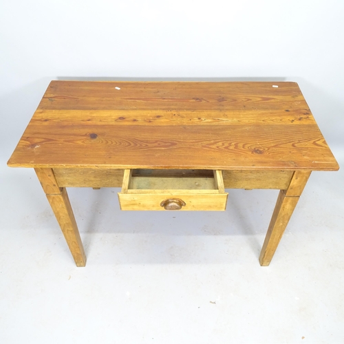 2536 - An early 20th century pine-top writing table, with single fitted drawer, on square tapered legs, 120... 