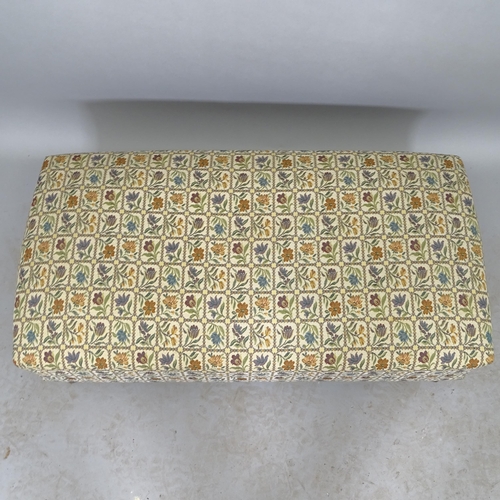 2540 - A contemporary upholstered footstool, 95cm x 35cm x 50cm