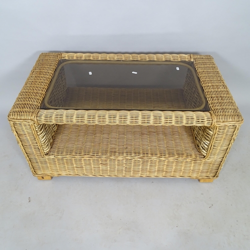 2544 - A contemporary wicker 2-tier coffee table, with inset smoked glass top, 98cm x 48cm x 55cm, and a ma... 