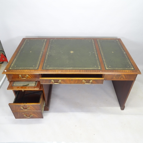 2546 - A reproduction mahogany centre-standing writing desk, with 5 fitted drawers, and 3 inset tooled and ... 