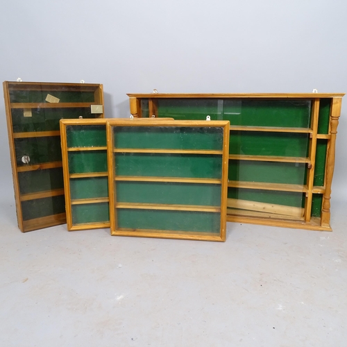 2556 - 4 various pine hanging display cabinets, largest 88cm x 56cm x 12cm