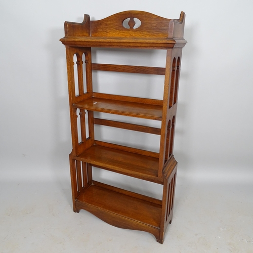 2561 - An Arts and Crafts oak open bookcase, with 4 fixed shelves, 62cm x 122cm x 22cm