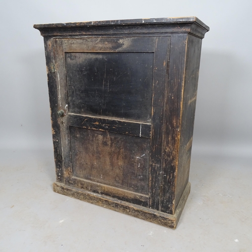 2563 - An early 20th century stained pine hall cabinet, with single panelled door and 2 fitted shelves, 76c... 