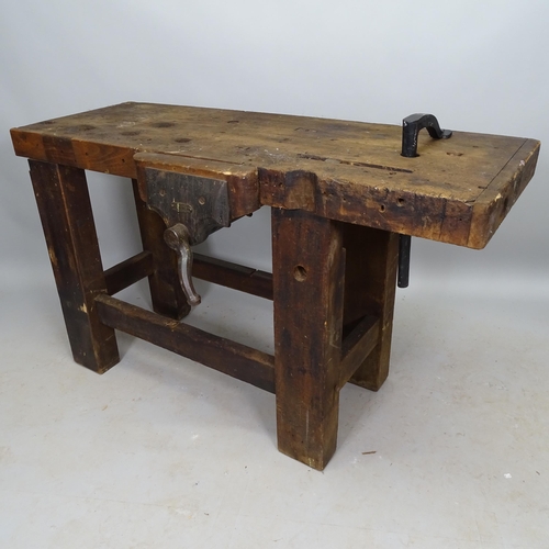 2571 - A Vintage stained pine work bench with fitted vice, 130cm x 78cm x 46cm