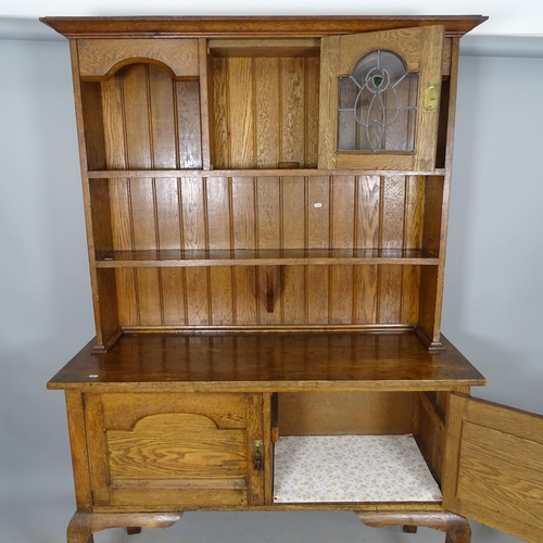 2590 - An Antique oak Arts and Crafts 2-section dresser, the top section with single leadlight glazed panel... 