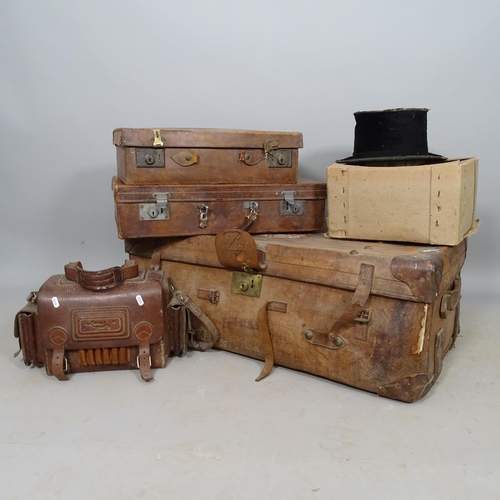 2591 - An Antique leather trunk, 2 leather suitcases, cartridge bag, and top hat (A/F) (5)