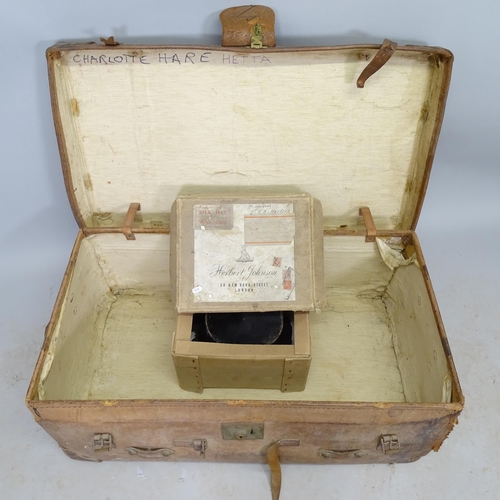 2591 - An Antique leather trunk, 2 leather suitcases, cartridge bag, and top hat (A/F) (5)