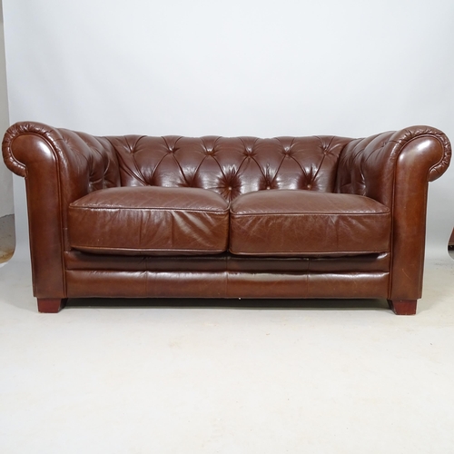 2597 - A contemporary studded brown leather button-back Chesterfield style 2-seater sofa, L165cm