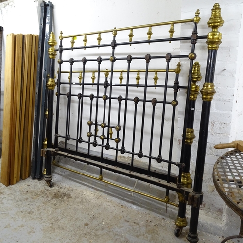 2617 - A painted cast-iron double bed, with slats and side rails, W155cm