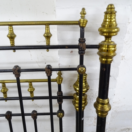 2617 - A painted cast-iron double bed, with slats and side rails, W155cm