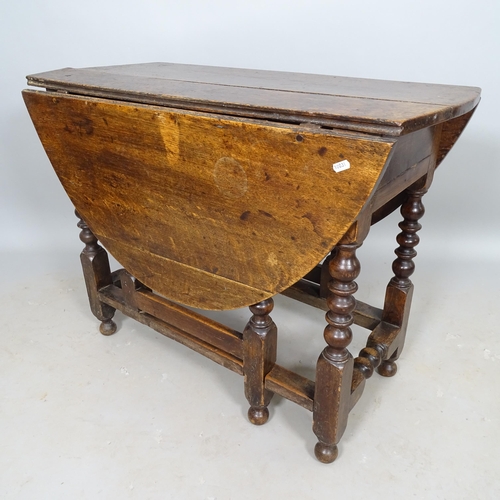 2627 - An Antique oak oval gateleg table, 91cm x 70cm x 45cm