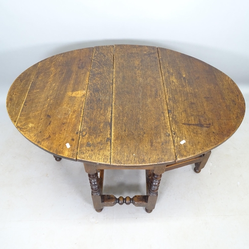 2627 - An Antique oak oval gateleg table, 91cm x 70cm x 45cm