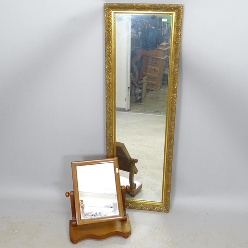 2637 - A modern rectangular gilt-framed wall mirror, 38cm x 119cm, and a mahogany swing toilet mirror (2)