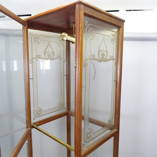 2639 - An Antique mahogany-framed shop display cabinet, with single door and glazed panelled sides, 62cm x ... 