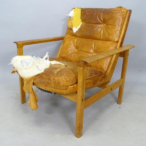 2643 - A mid-century Danish oak lounge chair, for reupholstery