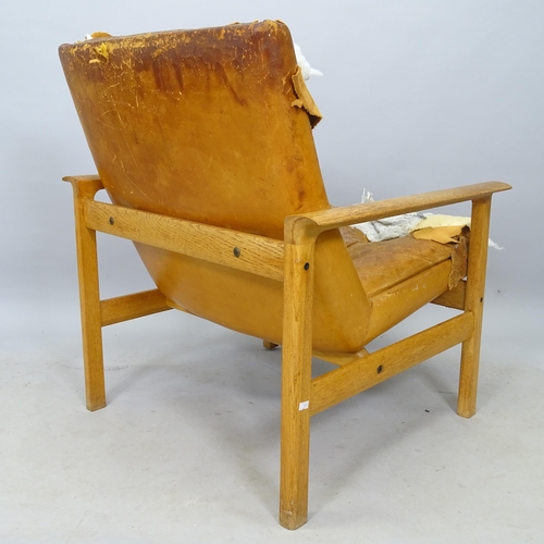 2643 - A mid-century Danish oak lounge chair, for reupholstery