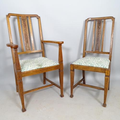 2650 - A set of 4 oak Arts and Crafts dining chairs with drop-in seats (2 + 2)