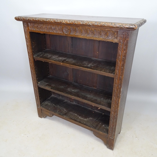 2664 - A Victorian oak open bookcase, with 2 adjustable shelves and carved decoration, 92cm x 104cm x 30cm