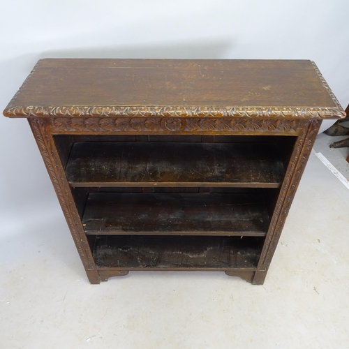 2664 - A Victorian oak open bookcase, with 2 adjustable shelves and carved decoration, 92cm x 104cm x 30cm