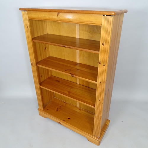 2665 - A modern pine open bookcase, with 3 adjustable shelves, 83cm x 123cm x 30cm