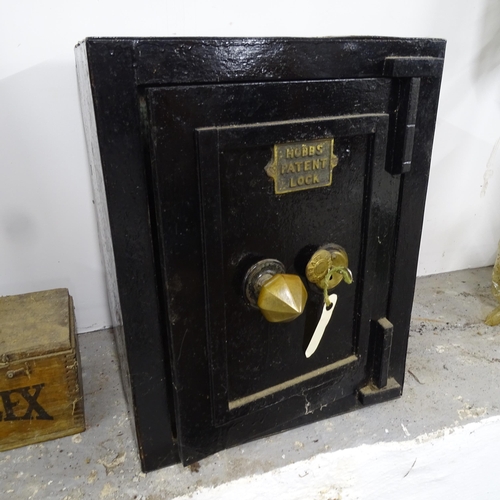 2681 - A cast-iron safe, with plaque for Hobb's patent lock, 40cm x 52cm x 35cm (with key)