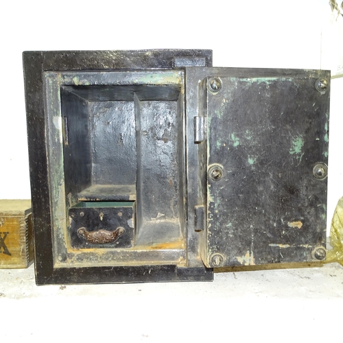 2681 - A cast-iron safe, with plaque for Hobb's patent lock, 40cm x 52cm x 35cm (with key)