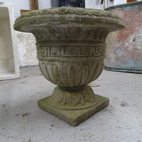 2683 - A weathered concrete garden urn, 41cm x 38cm