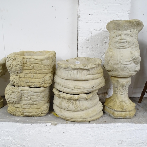 2698 - A pair of concrete sack planters, 45cm x 30cm, a concrete Toby jug figure, H45cm, and a pair of ivy ... 