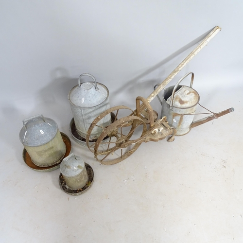 2713 - Various galvanised metal items, including watering can, and a wheel cultivator