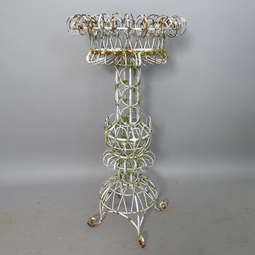 2720 - A wirework garden pot stand